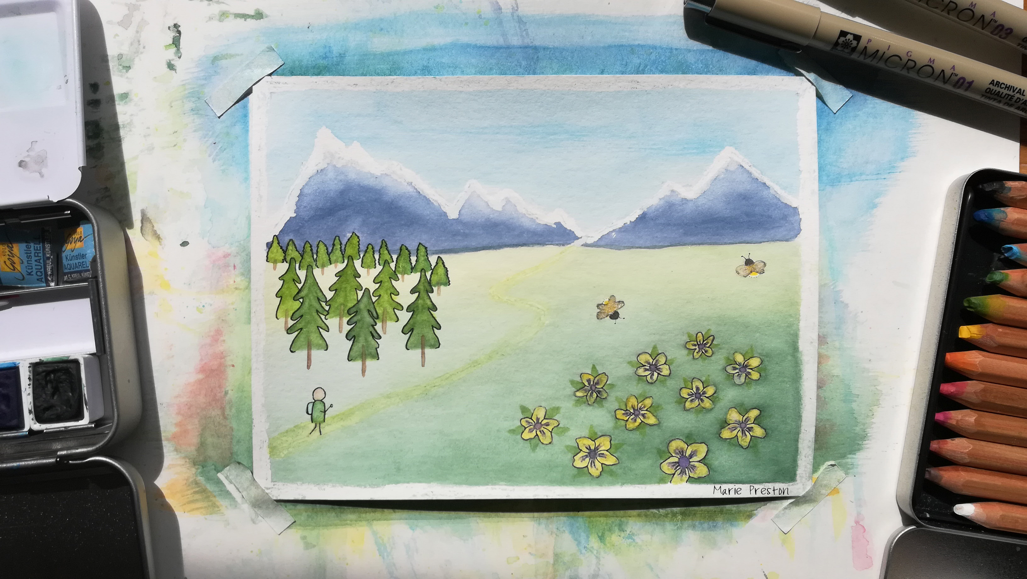 Midnight Sun (watercolour painting) Purple mountains with white peaks. Green trees, person on winding path, yellow and black bees above yellow & purple flowers ©2022 Marie Preston