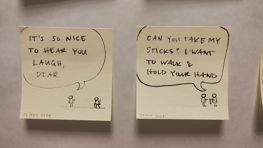 black ink comics on two yellow sticky notes